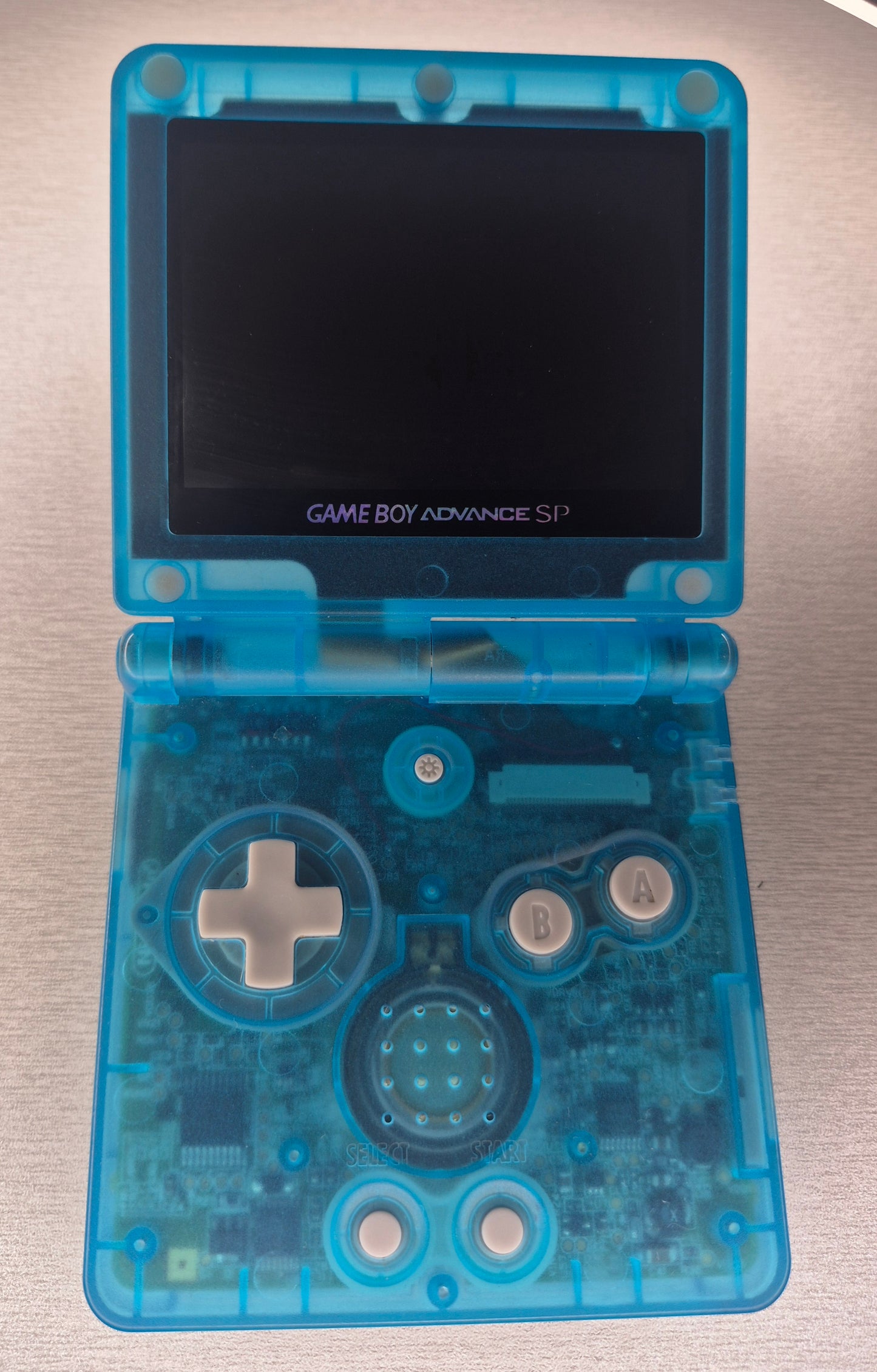 Original Nintendo Gameboy Advance SP New Backlit Screen,SEE Through(GITD) Blue Case,NEW Battery, Tested Inc.usb charger.