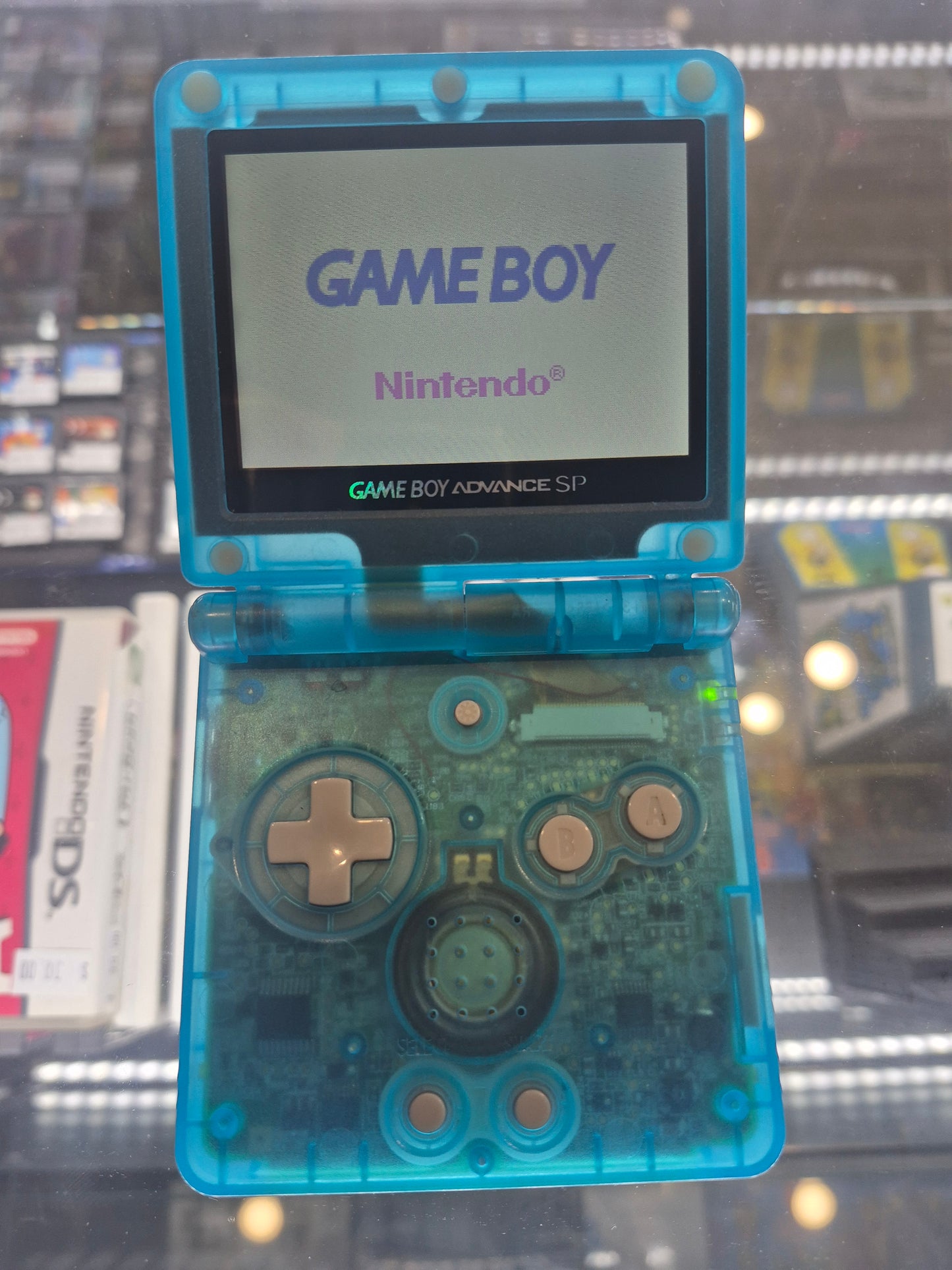 Original Nintendo Gameboy Advance SP New Backlit Screen,SEE Through(GITD) Blue Case,NEW Battery, Tested Inc.usb charger.