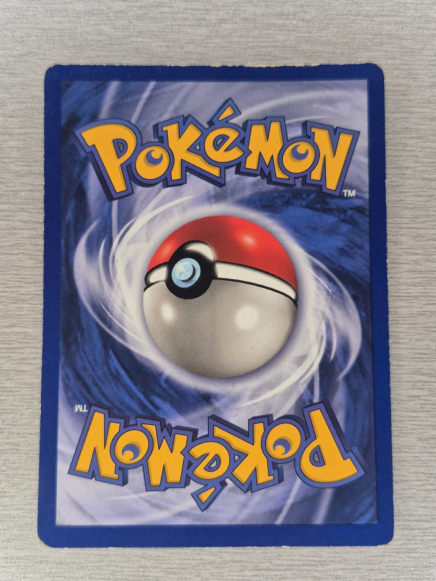 1999 Pokémon Fossil 7/62 Hitmonlee Holo MP