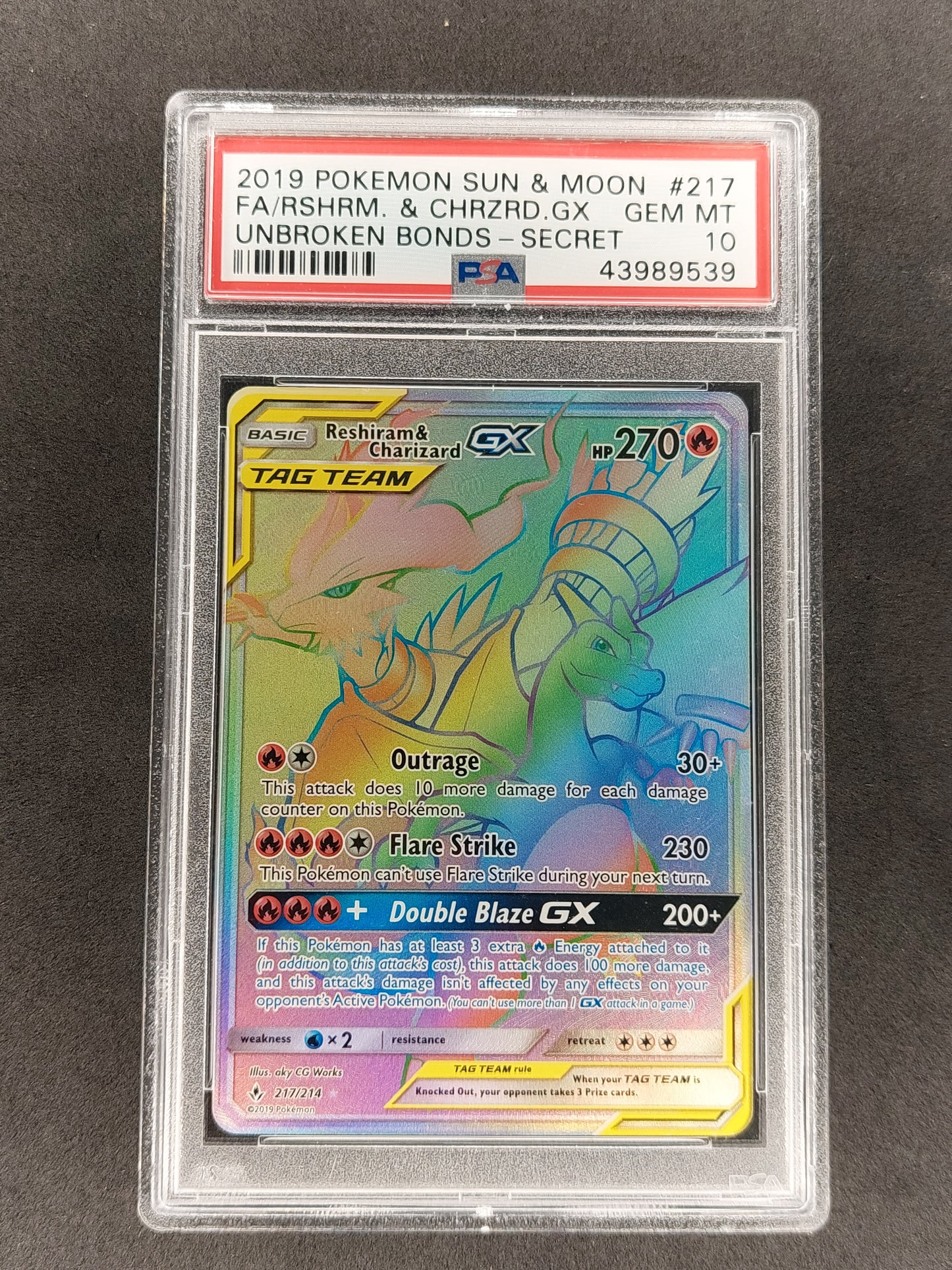 2019 Pokemon S&M Unbroken Bonds 217/214 Reshiram & Charizard GX PSA 10