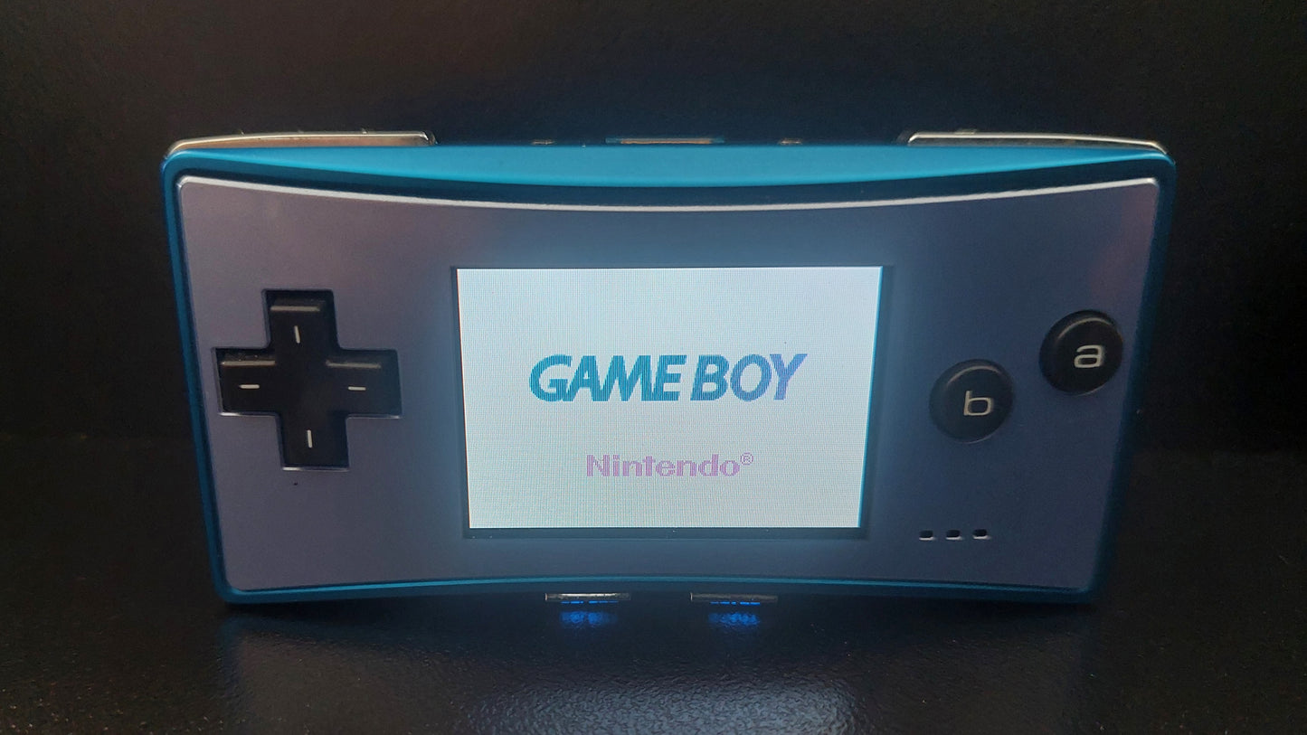 2005 Nintendo Gameboy Micro OXY-002 Backlit Console VGC Tested Includes factory charger.