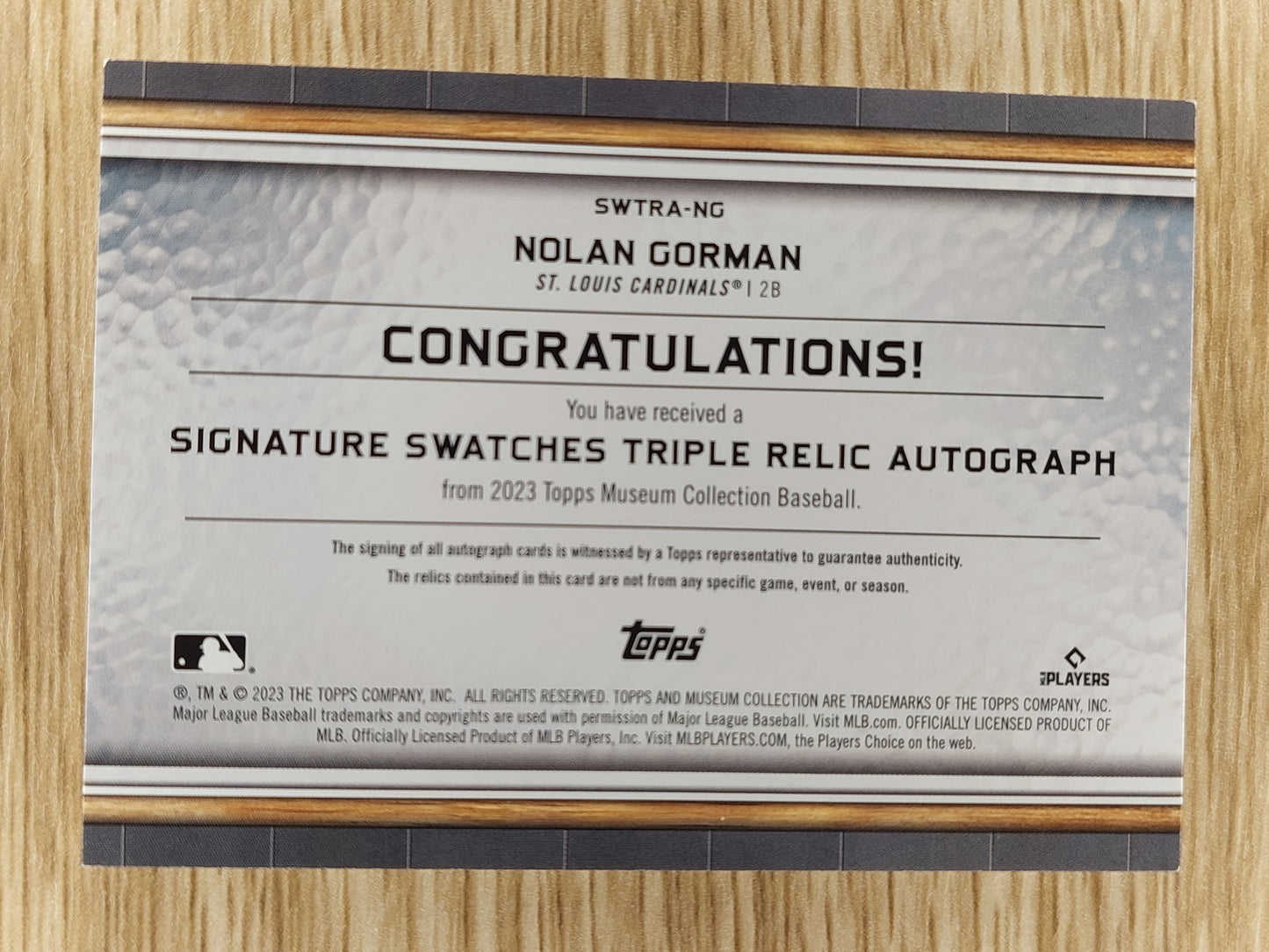 2023 Topps Museum Collection Baseball Signature Swatches Triple Relic Auto SWTRA-NG Nolan Gorman