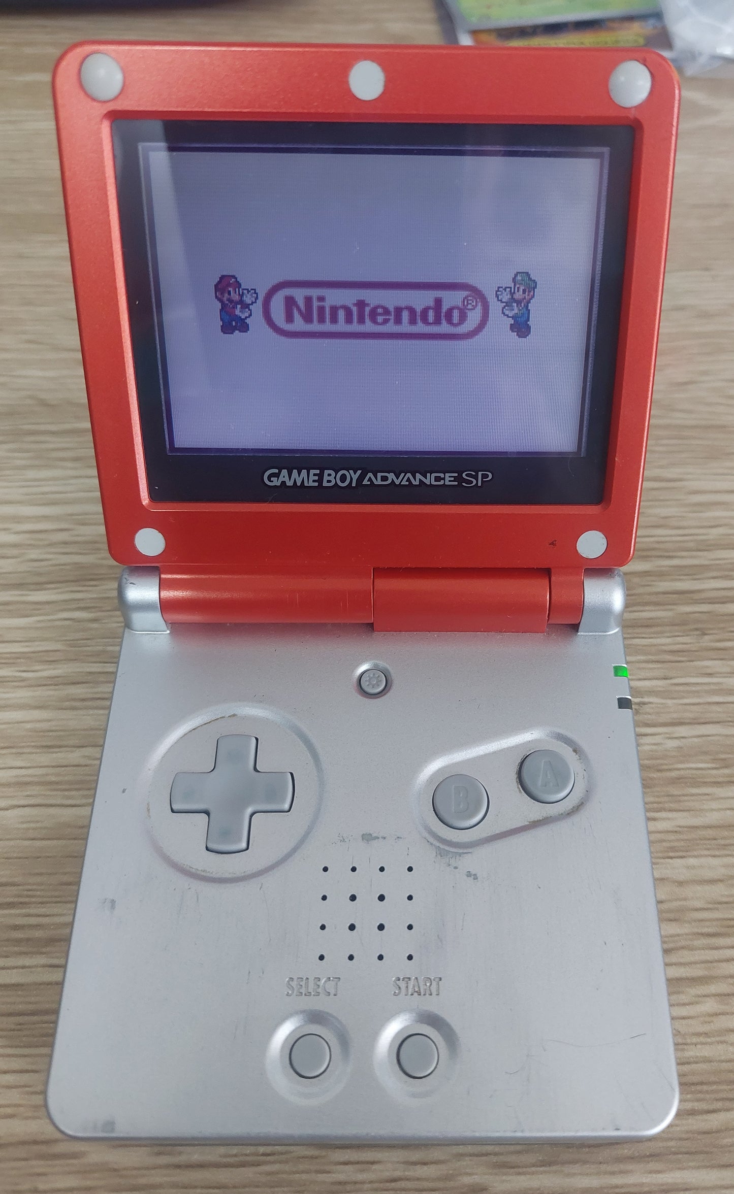 Original Nintendo Gameboy Advance SP Mario Edition in Good Condition, NEW Battery, Tested Inc.charger.