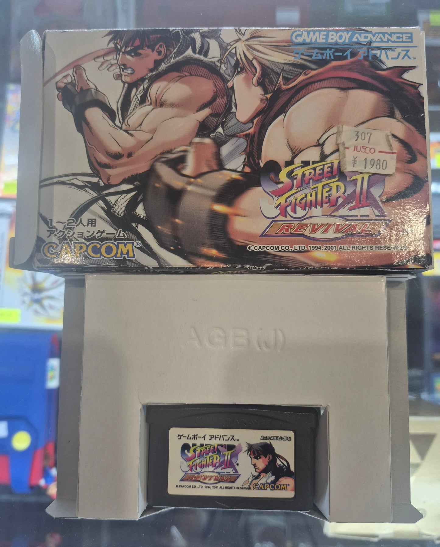2001 Japanese Gameboy Advance Capcom Street Fighter ll boxed w/ revival guide book.