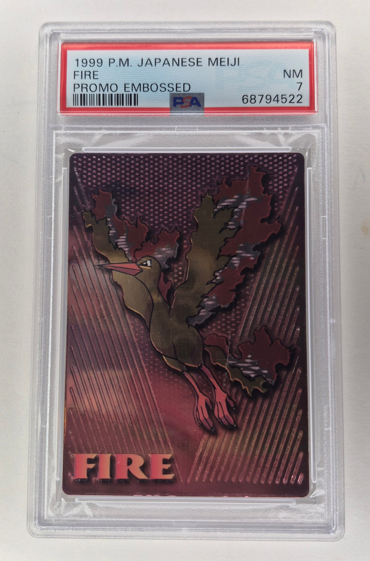 1999 Pokémon Japanese Meiji Fire Promo Embossed PSA 7 NM