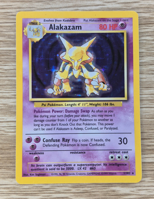 Pokemon 1999 Alakazam Base Set Holo Rare 1/102 LP