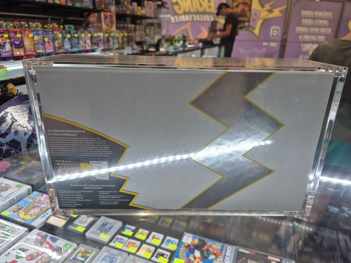 Pokemon TCG Celebrations Ultra Premium Collection Box Factory Sealed in acrylic case.