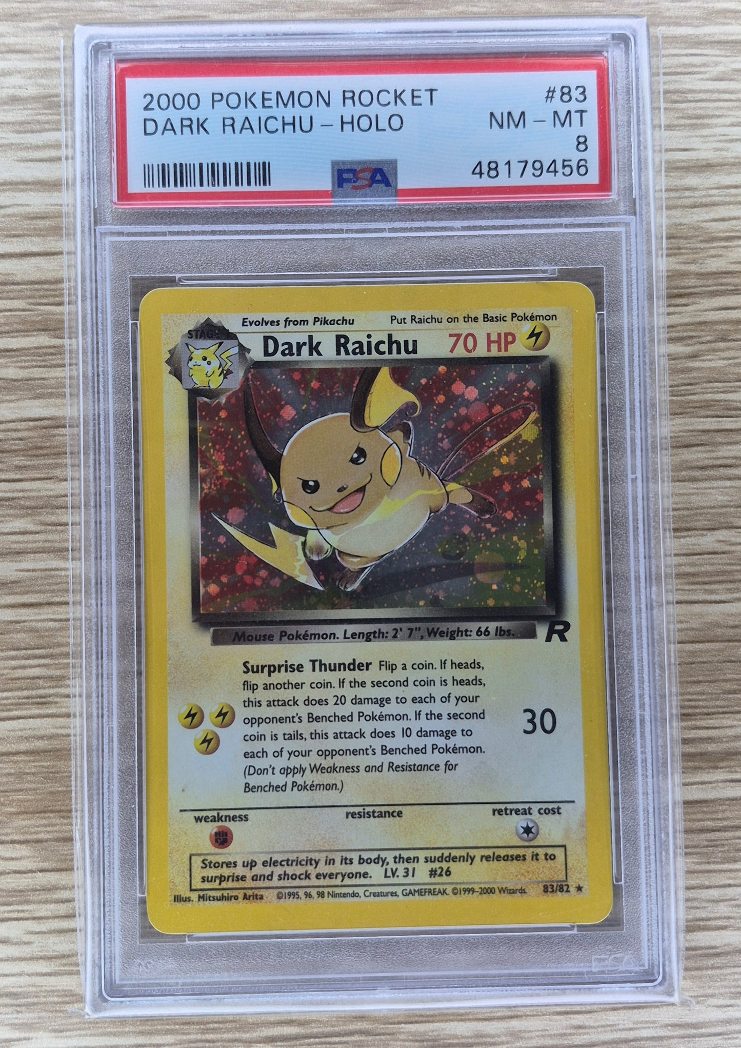 2000 Pokémon Rocket 83/82 Dark Raichu Holo PSA 8